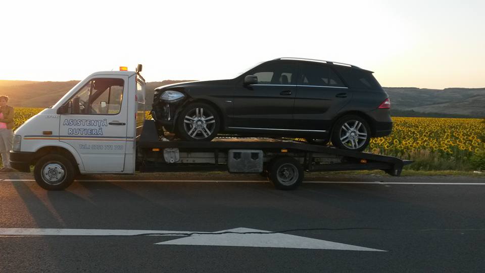 Tractare SUV defect pe platformă auto RIA Auto Trans Iași